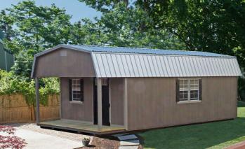 Driftwood urethane Signature Lofted Cabin with black trim and galvalume roof